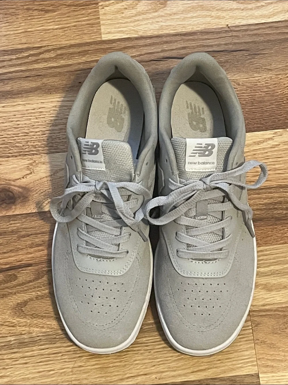 New Balance Men’s Light Gray Suede Sneakers